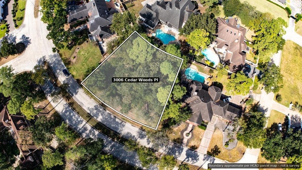 Aerial view with the lot outlined on Cedar Woods Pl