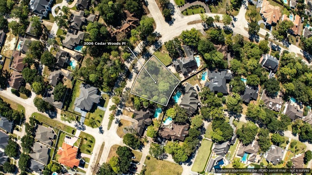 Aerial view of the lot and the surrounding neighborhood