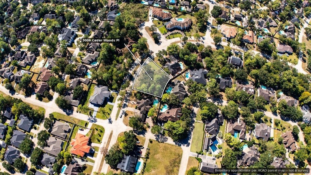 Wide aerial view of Northgate Forest Subdivision with the lot outlined