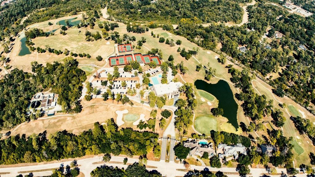 Aerial view of the nearby country club golf course and tennis courts